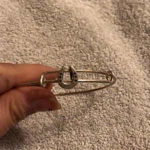Alex and Ani slide bangle with horseshoe